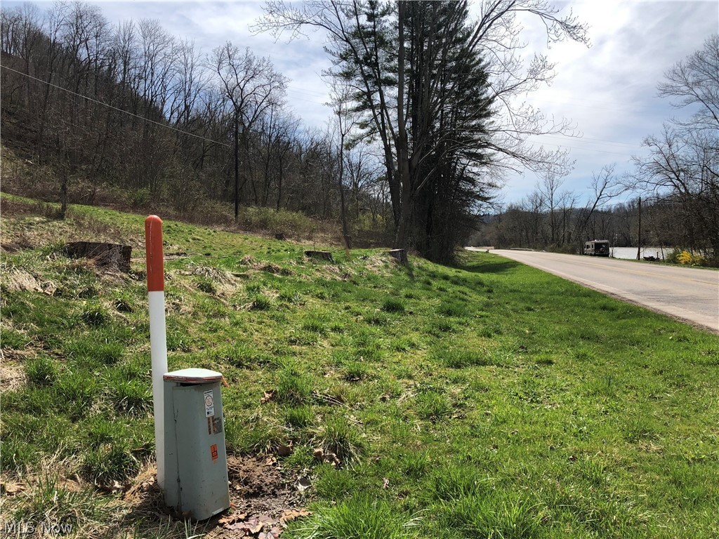 Stop renting a lot for your camper or RV because these lots provide a perfect location for a campground. A minute or quick walk from the Morgan County Fairgrounds. Don’t worry about being crowded by others. Previously there were mobile homes on the property with utilities. Enjoy the serene Riverview as the Muskingum River flows past. Public access boat ramp feet away for boating enthusiasts. The county offers historic sites, trails and buildings there is never a shortage of things to do. The big Muskie is a short drive. Plenty of wildlife evidence on the lots for nature lovers. Excellent on/off State Route 376 and minutes away from Main street. The property has a developed spring, pumphouse, two cistern holding tanks and a cement pad. Freestanding garage is ready to be filled with boating gear, ATVs and much more. Additionally you could set up camper sites and rent them while you’re away. The 6 lots offer so much the possibilities are endless.