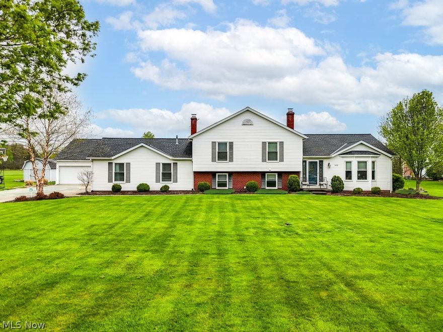 PRICED TO SELL FOR SUMMER MOVE IN! Welcome to this spacious & versatile home in Aurora! Situated on 1.76 acres, this property offers plenty of room to spread out & enjoy the peaceful surroundings. Totaling 5 bedrooms, 3 full baths, finished 2484sq. ft & add'l 600sq.ft.+ basement, this home provides ample space for functionality & comfort. Living room features a bay window filling the room with natural light. Kitchen includes all appliances, ample counter space & eat-in dining area w/ access to the backyard. Upper level features 3 bedrooms w/ updated full bath including walk-in shower, dual sink vanity & soaking tub. Family room is adorned with brick woodburning fireplace, creating a cozy atmosphere for relaxing evenings at home. Laundry room is a bright space equipped w/ cabinetry & plentiful counterspace, making it a perfect space to fold & sort with ease. 2ND full bath on this level w/ access to the basement w/ storage rooms & space perfect for a home theater, home office or anything that fits your needs! Original attached garage transformed into a unique living space, featuring 2 additional bedrooms, full bath & bonus room area that could be converted into a kitchenette- making it perfect for an in-law suite, guest quarters, or even a private retreat for older children. Step outside into the lovely flat backyard, where a sparkling pool & inviting patio area await, providing the ultimate summer oasis for outdoor entertainment & enjoyment. 35 x 35 ft. (6 car) garage is ideal for hobbyists, car collectors or families w/ all the extra sports equipment-featuring 9 foot single bay door & electric service. Additional shed/outbuilding can host the lawn & pool equipment for ideal organization. Conveniently located on the edge of Aurora, this home offers easy access to major roads & turnpike, nearby to Sunny Lake Park & short drive to dining & shopping options. Situated in the Aurora award-winning school system! Roofs replaced on ALL 3 stuctures 2021 & Hot water tank 2022!