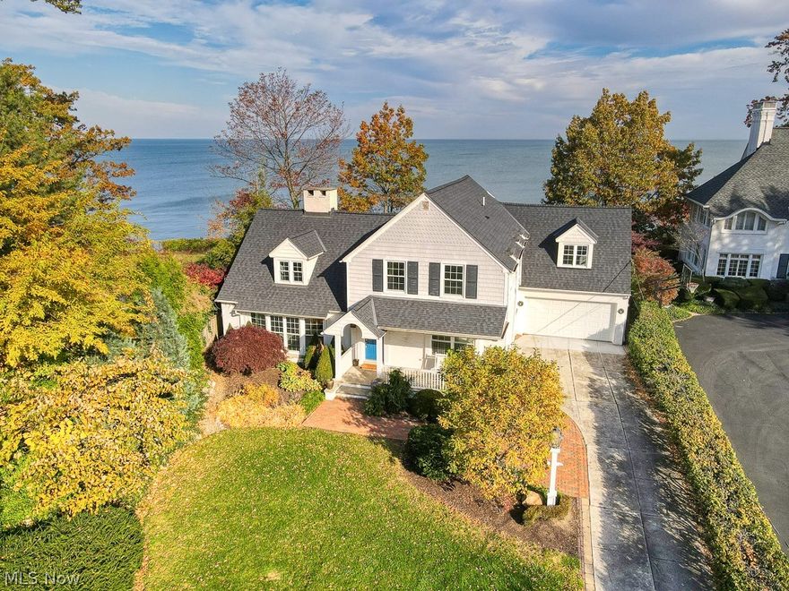 Opportunity is Knocking to own this COMPLETELY UPDATED Lake Front Property! Located in one of Lakewoods most desirable neighborhoods! What's new? Just about everything! The home was renovated down to the studs and all exterior walls have been insulated. Step inside and you will immediately notice the quality craftsmanship! Low maintenance vinyl flooring flows throughout the first floor. Large living room and family room feature fireplaces with shiplap accents and architectural mantles. Kitchen has been completely updated with quality cabinets, tile backsplash and quartz countertops! Second level offers three large bedrooms and a coveted second floor laundry. Master bedroom features dual closets and ensuite bathroom with expansive tile shower! Big ticket items include a new roof, windows throughout and HVAC. Attached garage for added convenience. Backyard offers a paver patio to take in all the lake views! Excellent location and move in ready make this home a true must see! Call today f