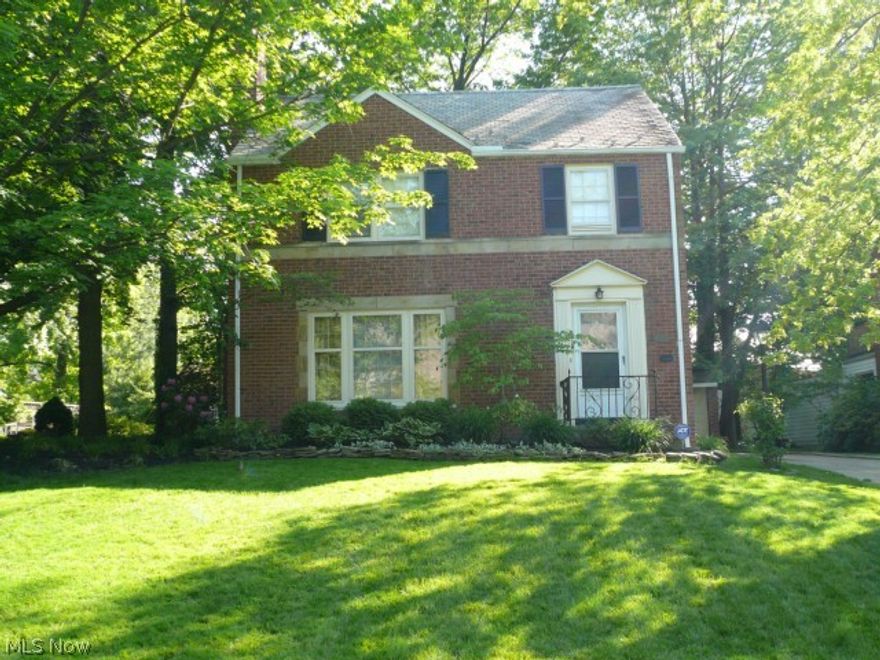 Character abounds in this lovely 1900 square foot brick home located just minutes from downtown Cleveland and steps from all that the Heights has to offer. Features include hardwood floors throughout, two gas fireplaces, new central air unit, eat-in kitchen with bay window, new granite countertops and some updated appliances. The three spacious bedrooms on second floor all have hardwood floors. Master and second bedroom have his or her closets. Updated full bath on second floor has a tub/shower combo and a second shower. The finished third floor is perfect for an office and the basement has Berber carpet, is wired for surround sound, has glass block windows and B-dry waterproofing. Security system and home warranty are included.