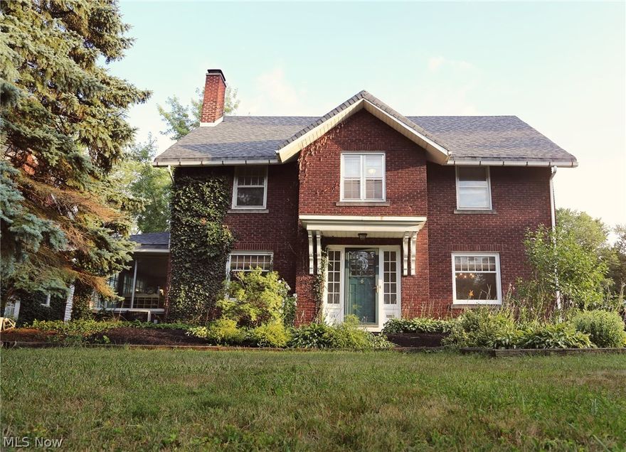 This large colonial features many new updates including remodeled kitchen, remodeled bathrooms, some new floor coverings, and roof replaced in 2014. Kitchen has marble counter tops & walls have subway tile with natural wood finish shiplap atop wainscoting.  Bathroom with subway tile & marble accents and flooring.  Master bath has 3" skinny lap & tiled floor.  Sunroom has exposed brick and lots of windows. Refinished Oak stairways.  Wonderful location close to shopping, restaurants, hospital, schools and more.  Nicely maintained with many updates, truly a must see for someone who appreciates quality and craftsmanship.  Five bedrooms listed but extra rooms could be used as additional bedrooms.