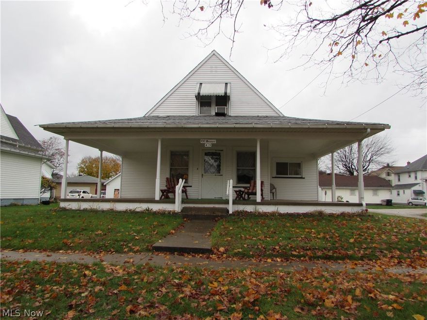 One Floor Living At Its Best!  You'll love sitting out on the spacious wrap around covered concrete porch.  One of the three bedrooms is conveniently situated on the first floor. The first floor full bath is handicap accessible. Two and a half baths will speed everyone along in the morning.   The 12 X 24 living room invites family enjoyment.   The eat- in kitchen has lots of natural cabinets and a built in desk.  A step saving 1st floor laundry room and half bath is close by.  The 12 X 15 master bedroom has a walk in closet and the upstairs full bathroom also has a walk in closet.  The first floor full bath is handicap accessible.    The two car garage has plenty of additional storage.  Great location!  This homes is situated across the street from the park where you can enjoy the walking path, tennis and basket ball court, play ground and all the fields for sports activities.  Flood Insurance is not required.