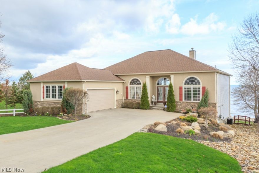 Stunning sunset view from this gorgeous Lake Erie front retreat. Built in 2008 this home is in move in ready condition. Enjoy amazing lake view from every room on this open floor plan ranch home. First floor has formal dining room, great room with gas fireplace, large open kitchen with granite , large pantry, spacious breakfast bar and large dining area surrounded by windows. Master suite with access to deck, large walk-in closet and glamour bath also on first floor. Lower finished walk-out has two more bedrooms, full bathroom, family room and second kitchen, doors leading out patio, perfect for your summer lake front entertaining. Break wall  installed in 2012.