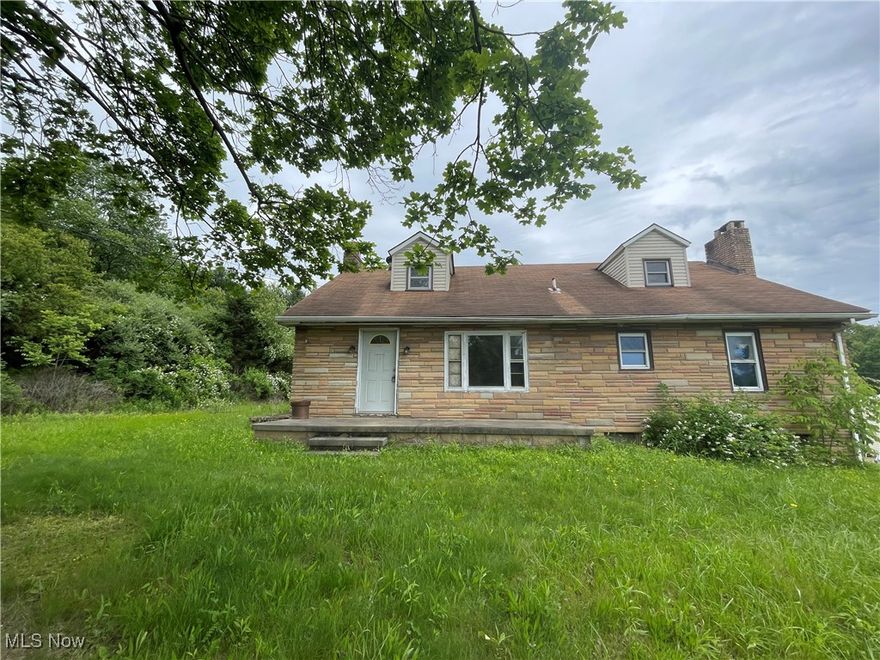 Cape Cod style home located on 2.4 acres. 2 bedrooms on the main level with a full bath along with living room, kitchen and dining area. Upstairs are 2 more rooms and a half bath. The basement has a fireplace in the living area along with another full bath. Property sold as is. No guarantees. No warranties. Must be pre-approved or show proof of funds.