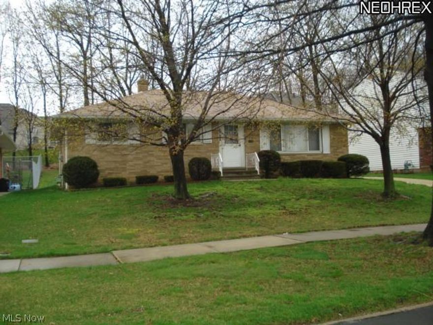 Solid Brick Ranch backing to the woods!!Eat in kitchen and formal dining rm!!First Floor half bath off hall or master bedroom!!Shower stall in the basement!!Hardwood floors under the carpet!!Close to schools,shopping,hospitals,conveniences!!Motivated seller wants this home sold!!