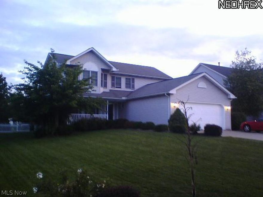 Nothing to do but move into this charming front porch colonial in this popular Medina neighborhood, close to everything.  You will enjoy the treed, fenced-in back yard from the four-seasons sun room or the exterior deck.  The home has been freshly painted throughout and includes all kitchen appliances.  Beautifully finished basement with recreation room and separate bonus room.  2 Car Garage with hot/cold water and ample attic space.  Includes Home Warranty.