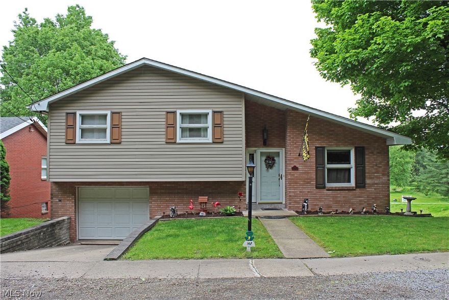 Come Home to this lovely 3 bedroom, 1 1/2 bath multi-level home with hardwood floors, a gas fireplace in the rec room and a nice deck off the living room. Call for your showings today!