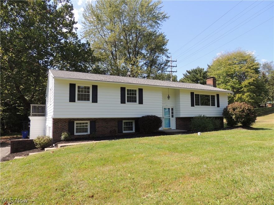 Huge two level home updated and renovated with today's decor: Vinyl plank flooring, laminate flooring, subway tile and farmhouse sink in kitchen,  ceramic tile in baths. Master suite on first floor and lower level.  3 full baths. 2+ car attached garage.  HUGE deck with access from master bedroom and dining room. 2 woodburning fireplaces. Every inch finished and in move in condition. No work here.  Great deal in a great area.