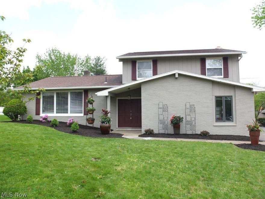 Exceptionally remodeled 3 bedroom, 2.5 bath split level on cul-de-sac in Plain Local Schools! Very spacious 21x13 living room w/new carpet. Family room w/fireplace and new bamboo hardwood flooring. Formal dining room with chair rail and bamboo flooring. Beautiful kitchen w/breakfast bar seating for 4, granite countertops, stone backsplash and stainless steel oven, range and dishwasher. Master suite w/double closets including a walk-in closet and remodeled private full bath w/ceramic floor, tile shower and new vanity w/granite countertop. 2 additional good sized bedrooms w/new carpeting. 2nd full bath has been completely remodeled w/ceramic floor, tile shower and new vanity w/granite countertop. Office or possible 4th bedroom in the lower level w/walk-in closet. Cedar closet too! Enclosed porch w/vaulted ceiling and skylight, a wonderful place to relax! Deck overlooking the backyard and 2 car side load garage. 2 blocks from Middlebranch walking trail and close to Gervasi Vineyard!