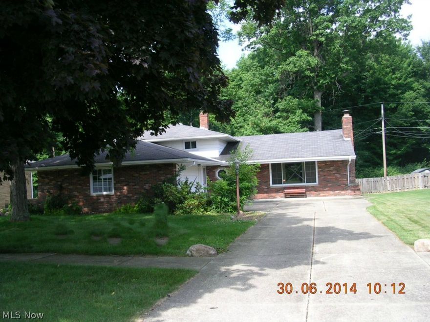 Tons of room to grow in this spacious split level that is over 2,300 sq. ft.  Enjoy a large laundry/utility room with tons of cabinet and counter space.  Large living room with fireplace for cold Ohio winters. Large eat-in kitchen, family room, formal dining room, and a heated sunroom to be used year round. Upstairs bedrooms have tons of closet space and hardwood floors. Vinyl replacement windows throughout. Large yard great for entertaining and covered patio off the back of the yard.  Don’t miss out on this fantastic opportunity.