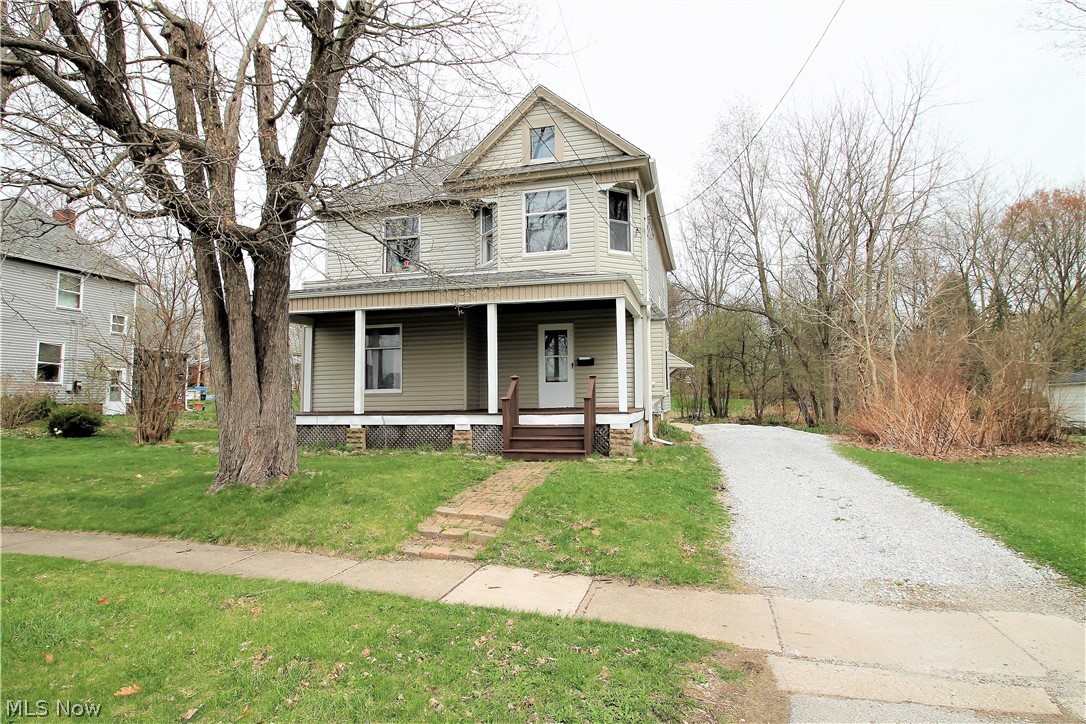 Welcome to this charming four bedroom, one and half bath three story colonial. The inviting front porch has you entering into a open sitting room which offers original woodwork, large window and staircase to the upstairs. The living room leads to the formal dining room with crown molding, pocket doors and laminate floors throughout the first floor which has hardwood flooring underneath. The large kitchen offers granite counters, stainless steel appliances and wood cabinets. The first floor half bath has tile and granite counter. There is a back staircase off of the kitchen to the four spacious and large bedrooms and full bath. The beautiful backyard completes the back porch, patio and a hot tub-currently not working. So many updates include new gravel drive, sump pump new 2018, furnace 2018 and electric box new 2018. Roof, gutters 2012 and plumbing has been redone.