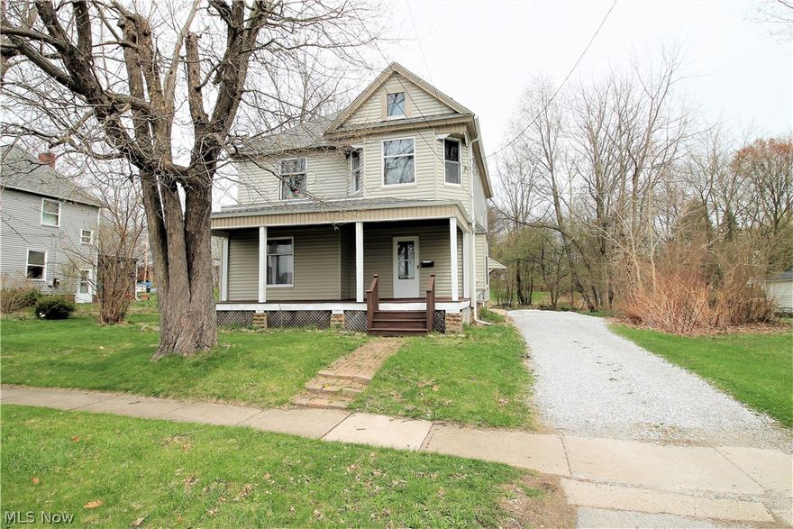 Welcome to this charming four bedroom, one and half bath three story colonial.  The inviting front porch has you entering into a open sitting room which offers original woodwork, large window and staircase to the upstairs. The living room leads to the formal dining room with crown molding, pocket doors and laminate floors throughout the first floor which has hardwood flooring underneath. The large kitchen offers granite counters, stainless steel appliances and wood cabinets. The first floor half bath has tile and granite counter.  There is a back staircase off of the kitchen to the four spacious and large bedrooms and full bath. The beautiful backyard completes the back porch, patio and a hot tub-currently not working. So many updates include new gravel drive, sump pump new 2018, furnace 2018 and electric box new 2018. Roof, gutters 2012 and plumbing has been redone.