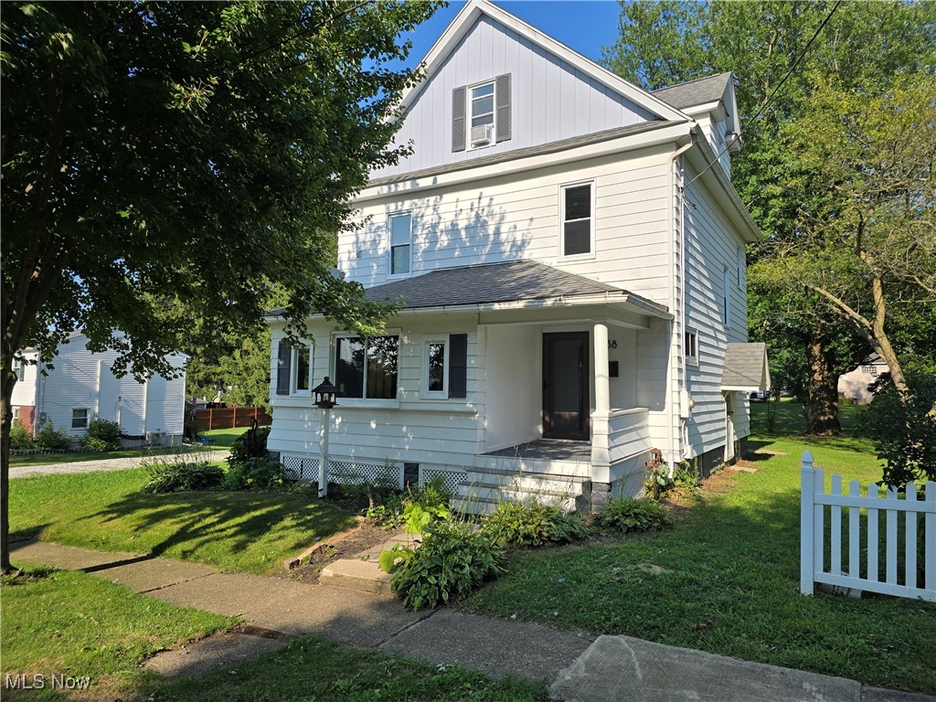 Big and Beautiful! Lots of yard (2 lots) with a nice patio area, lots of old woodwork, lots of updates (windows, bath, kitchen, flooring, paint, lighting and more. Oversized garage too. Finished 3rd floor currently has 2 rooms. Basement has a rec room, laundry room, and a full bath. It is fresh and ready to be loved.