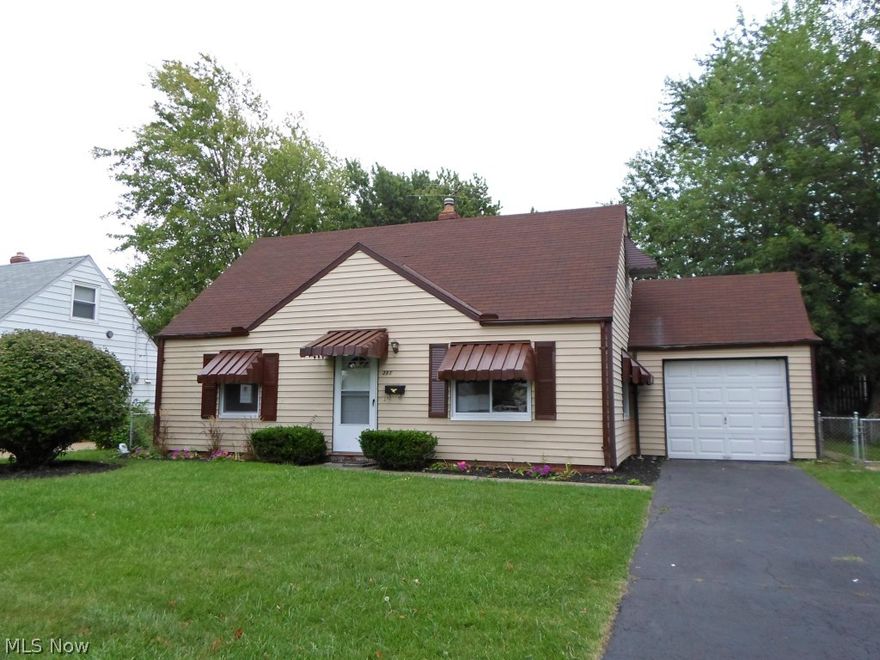 Come check out this beautifully rehabbed bungalow style home with 3/4 bedrooms and 1,409 square feet of living space and a 1 car attached garage. This property features newer vinyl siding, new vinyl windows, and new entry doors.  The kitchen is updated with gorgeous tile backsplash, updated cabinets, plumbing fixtures, ceramic tile floor and microwave.  The bathroom is updated with gorgeous tiled tub surround, with a modern sink, ceramic tile floor and fixtures.  This property has been freshly painted throughout and features new flooring throughout.  The hot water tank is new and electrical panel has been upgraded along with upgraded electrical wiring.  The property also features a newer furnace.  This property is truly move in ready and nicely updated.