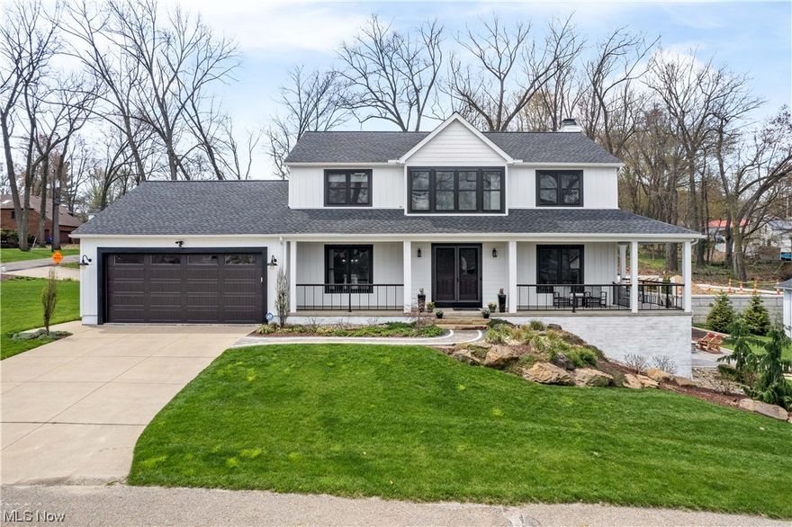 Enjoy PLX lake life this summer! Completely updated lake view home with a dock (available separately) on quiet cul-de-sac in Turkeyfoot Heights/Green School District. This professionally landscaped home must be seen to appreciate. Main level has office & large closet right off foyer. The eat-in kitchen with custom cabinets, granite countertops, & island features SS Frigidaire Professional Series appliances & is open to the family room. There are sliders to private composite deck, with access to the wrap-around porch. Dining room (currently used as a play area) is open to the kitchen. The main level finishes with half bath & laundry room with pet door leading to fenced-in area for furry family members. Upstairs is primary suite/bath, complete with dual vanity, soak tub, shower, walk-in closet & additional space that can be used as an office/reading nook. Two more bedrooms & bath are also upstairs. Lower level has bonus room that could be theater room/guest room, full bathroom & utility