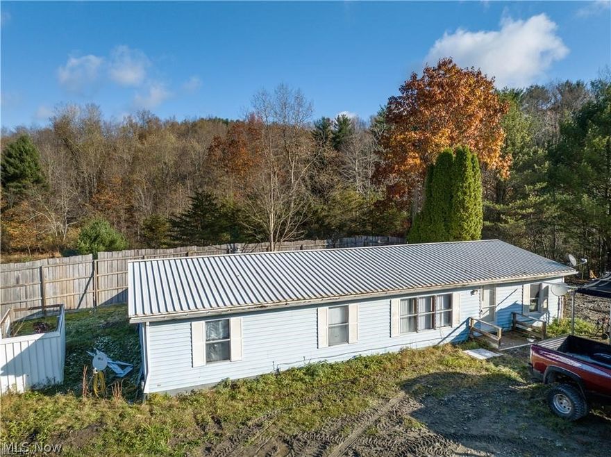 Investment Property: 7,500 sq ft warehouse with office space available. This investment property offers a 3-bed 1
bath home, a warehouse, a large aggregate parking lot and a small pond all situated on 7.91 acres. This property is
adaptable for many different types of investment needs. Call today for a private showing.