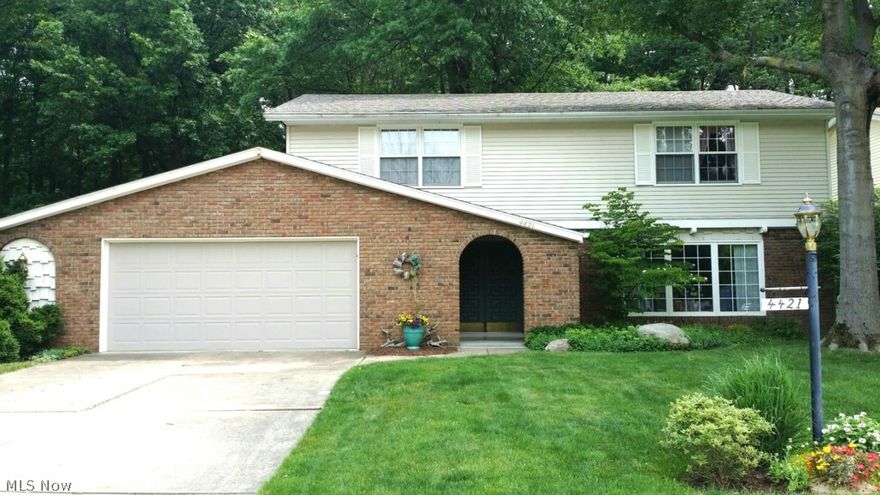 Stunning Former Model Home on Desirable side of Washington Street set against the preserved private woods behind! Super large 4 bedroom with whole House Central Air Conditioning! Gas Fireplace and and open floor plan make this one of the areas Best Buy's! Extra Deep 3+ Car Garage add the rare features. Newer Stainless Appliances, 1st floor laundry, solid wood doors and beautiful wood trim thru out. Large bright Formal Dining Room with view of the woods and is open to the formal living room. A cozy eat-in kitchen dinette area flow into the large family room with stone surrounded gas fireplace with a slider leading to the brick patio. Four super large bedrooms upstairs, including the Master Bedroom & Master Bath. Three large Bedrooms share the additional Full Bath. Original Pella Windows, recently painted exterior and many newer updates including a One Year Home Warranty make this home stand out.