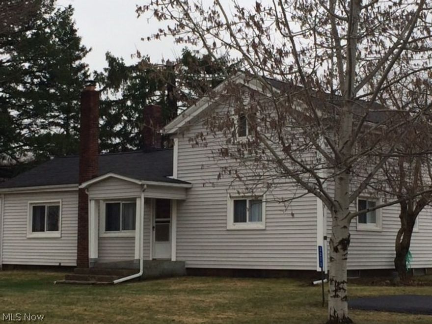 Great opportunity in Rootstown!  Move right in to this beautifully updated 2 story home.  New carpet and paint throughout.  Sparkling clean condition.  Many major updates throughout.  (Siding, Roof and Windows updated in 2000.)Situated on awesome 4.714 acre lot with loads of frontage. Very peaceful setting with well established trees for privacy.  Great 2+ car, 32x24 detached garage with concrete floor, built in 2000.  Paved driveway.  Only 5 minutes to I-76!  Very affordable and priced to sell quick!