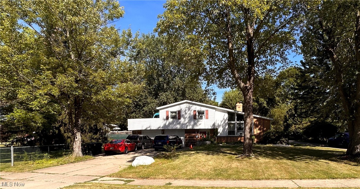 This home is a must see!! This 4 Bed 4 Bath home has something around every corner. Multiple kitchenettes and laundry areas and multiple living spaces throughout. The home features vaulted ceilings and fireplaces. Outside you have plenty of parking and an outbuilding for storage. The backyard is spacious and has several fruit trees! Schedule a showing today!!!