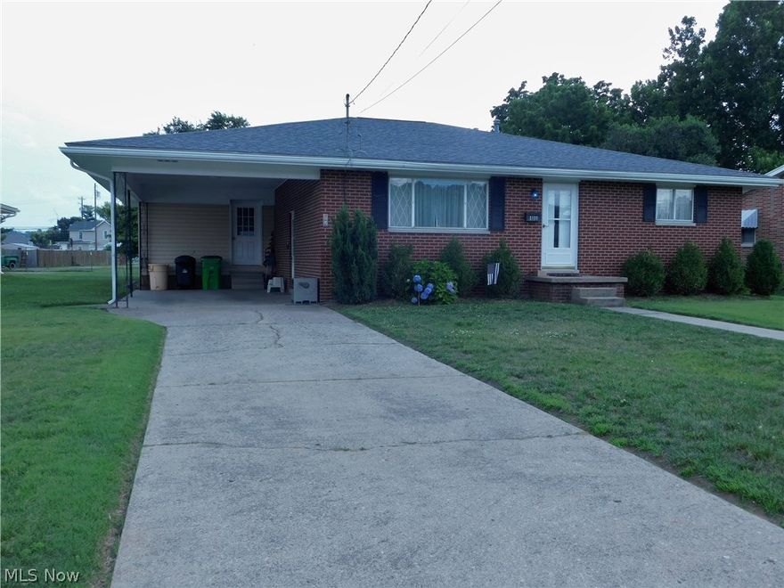 Come and see this wonderful 2 bedroom 2 bath brick home with a possibility of a 3rd bedroom by converting the original living room to a bedroom. 
Partially finished basement with laundry area, bathroom with shower, sitting room, and two bonus rooms currently used as bedrooms.  
Spacious family and dining room area with a sun porch that leads to a workshop! No garage, but there is a covered carport area that has direct access into the home and could be converted to garage. Don't wait... Call today!
