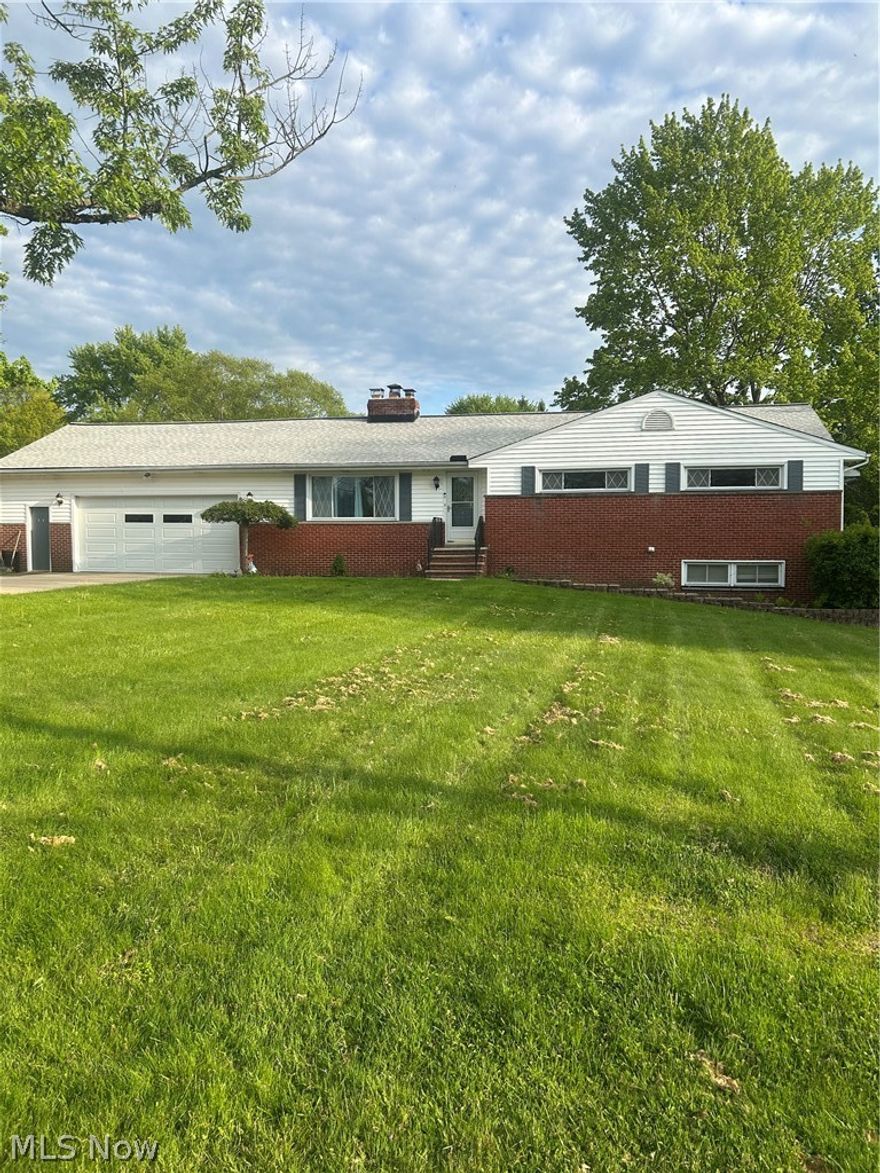 A must see beautifully remodeled ranch. Walk in front door to a spacious living room with wood burning fireplace and newer LVP flooring. Continue into large kitchen that was totally re done in 2024 with new cabinets, marble counter tops, a huge island topped with marble, stainless steel appliances, modern backsplash and flooring. From kitchen enter the huge family room bathed in natural light from all the windows. This also leads to a totally enclosed 3 season room with sliding doors that take you onto outdoor patio. Hallway leads to 3 bedrooms and totally re done in 2024 bathroom with walk in shower. Master bedroom features another full bath from 2024 with jetted soaking tub and high end fixtures. Finished walk out basement offers another 1000+ sq ft of living space with entry to a fenced dog run, laundry area, half bath re done in 2024 and large space with a wet bar. Oversize garage could probably fit 3 cars and has entrance to 3 season room. Yard is almost 1 acre with gorgeous pond. Also in 2024: new roof, HVAC, updated electrical