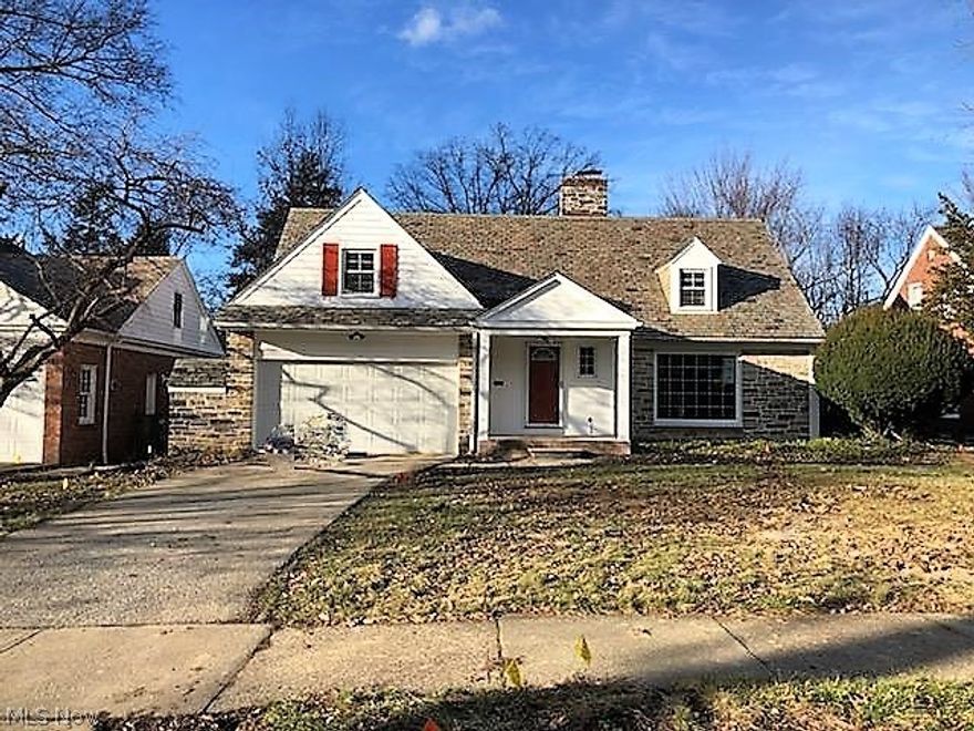 Beautiful Forest Hill home in Cleveland Heights just underwent extensive renovation, absolutely gorgeous & ready to move right in! Real Stone on the exterior compliments the freshness of brick & white exterior w/ stunning slate roof & many muted colors to flow for a curb stopping view! Home is much larger than it appears: Enter from the covered front porch to the Foyer w/ slate flooring & coat closet to see the Grand Living Room w/ beautifully refinished hardwood floors throughout the main living area, gorgeous fireplace, large windows & stunning trim throughout; wind around to the magnificent view from the true Dining Room open to the Kitchen & enclosed 3-season Sun Room w/ French Doors & lots of glass for amazing views of large back yard~ an addition in 2015 w/ wall AC; Kitchen has delightful full height white cabinetry accented by gorgeous granite countertops & Breakfast Bar along with slate stainless steel full appliance package & all the goodies you'd expect in this show stopper k