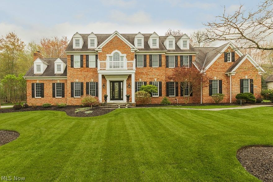 Welcome to Prestige Builders' exquisite brick home on a beautiful lot with stunning views all around...Shows like a model home. Meticulously maintained. Two story entry, 10 ft. ceilings & solid 8 ft. doors throughout. Newly refinished hardwood floors in foyer, kitchen & sun room. Gorgeous cherry cabinetry in kitchen w/huge center island, granite counters & all newly upgraded SS appliances including a 5-burner gas cook top. Storage abounds w/spacious, wraparound custom designed & crafted dual pantries....an organizers dream! Dual staircase, solarium w/views of lush landscaped setting, paver patio & beautiful wooded scenery. Exceptional master suite w/vaulted ceiling & double entry doors. Master Bath w/cherry cabinets & vaulted ceiling, columned tub area & dual fireplace to enjoy those cool nights. Newly remodeled & expanded custom 10ft high travertine tiled shower w/custom glass door & his/her walk-in closets. Ample sized, newly painted bedrooms all with new ceiling fans, including one