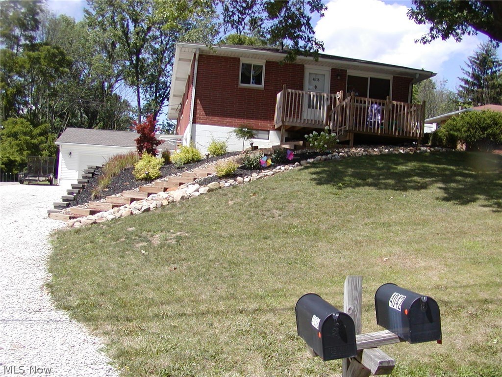 Lot 80 X 235: Beautifully updated ranchplex perfect for owner occupant. 3 bedrooms in updated front unit with newer kitchen, newer windows, central air and 1 car garage. Owner lives in back unit with 2 bedrooms, newer kitchen with ceramic tiled floor, island with butcher block counter, dishwasher, appliances ,beautiful hard wood floors in formal dining, bedroom and living room to privacy fenced patio area. Lower area has 11 X 16 master bedroom with 8 X 11 walk-in closet with sink and vanity and private shower bath, family room plus 2 car attached garage. Roof 2011, windows--2010, hot water tank on owner's side--2017. Storage shed in back. Dishwasher and microwave in owner occupied unit only. Total square footage including the finished areas of the walkout basement on both sides is 1981 square feet.