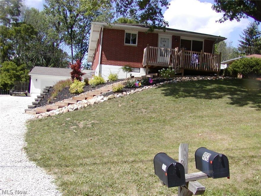 Lot 80 X 235: Beautifully updated ranchplex perfect for owner occupant. 3 bedrooms in updated front unit with newer kitchen, newer windows, central air and 1 car garage. Owner lives in back unit with 2 bedrooms, newer kitchen with ceramic tiled floor, island with butcher block counter, dishwasher, appliances ,beautiful hard wood floors in formal dining, bedroom and living room to privacy fenced patio area. Lower area has 11 X 16 master bedroom with 8 X 11 walk-in closet with sink and vanity and private shower bath, family room plus 2 car attached garage.  Roof 2011, windows--2010, hot water tank on owner's side--2017.  Storage shed in back. Dishwasher and microwave in owner occupied  unit only.  Total square footage  including the finished areas of the walkout basement on both sides is 1981 square feet.