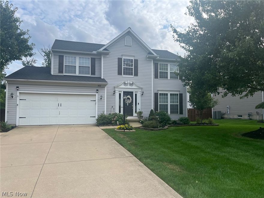 Located in sought after Waterford Village community, this home offers a blend of comfort and convenience. Formal living room, dining room, eat in kitchen with center island, stainless steel appliances. Newer patio door w/built in blinds leads to a huge newer 32x20 deck perfect for summer bbq's. and overlooks a private fenced yard, pool with shed for extra storage. Hardwood floors in foyer and kitchen. Family room has gas fireplace and newer ceiling fan. Convenient first floor laundry. The owners suite has cathedral ceilings, fandelier, beautiful updated private bath, skylight and walk in closet. Hall full bath also updated with skylight.  The finished basement expands your living space with sports bar style, wet bar, sitting area, theatre room. Includes wine fridge and full size fridge,  three TV's, sound system, theatre chairs, and bar stools.  A/C 2024, Skylights 2023, Roof 2019. Newer lamp post, landscaped yard with lighting, with extra 2 car driveway expansion. Home is located next green space. Close to everything