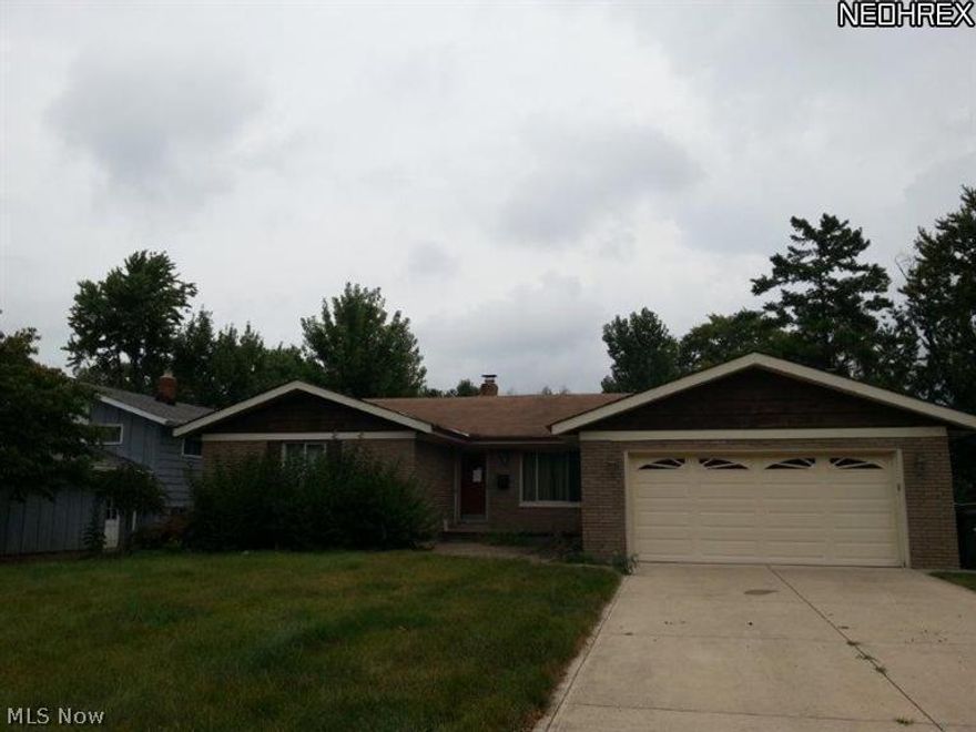 3 Bedroom Brick front Ranch with attached garage & Heated In-ground Pool W/Automatic Vacuum in Desirable section of North Olmsted.