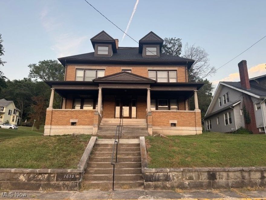 Discover this 4,000 sq ft. 3 story, colonial home nestled in a wonderful neighborhood known for its welcoming charm. Built in the early 1900's, this pristine resident boasts classic architectural details and an abundance of character. With its charm and so many nostalgic features like the formal living & dining rooms, the formal parlor and sun room are complimented with hardwood crown molding, coffered ceilings and elegant original hardwood baseboards. The elegant wooden staircase compliments the entire home. The home offers 5 nicely sized bedrooms with the original sinks in each bedroom along with recessed medicine cabinets. The formal parlor & living room have fireplaces enjoy during chilly evenings. The large eat-in kitchen also has an alcove complimented with hardwood which offers additional seating. Beautiful front porch with beveled glass front door welcomes all. Relax on the front porch that looks over the beautiful hills of Ohio. A true gem, this 1912 home blends historic with modern comforts in an unbeatable location.