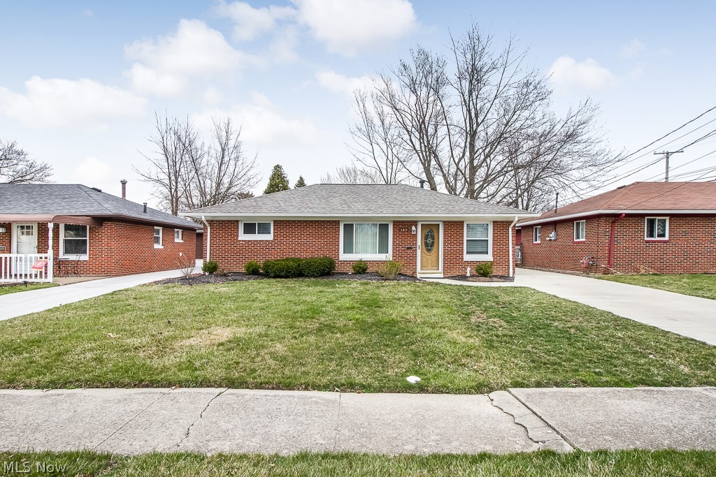 Completely updated ranch you wont want to miss out on. Home has new roof, windows, granite counter tops, updated kitchen and appliances, new poured concrete driveway and patio. Conveniently located across from a park, and minutes away from shopping and ore. Easy one floor living plan with central air and the back door leads to a great size fenced in yard! The laundry is off the kitchen with additional cabinet space. The well maintained home is extremely charming and will go fast!