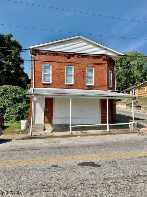 This nice brick building is situated on two parcels, on a corner lot in town. Off street parking is available for tenants. There are a total of 3 units. The two units located on the upper level have been completely remodeled (new flooring, kitchen, baths, lighting, paint and more). The two units on the upper level both are two bedroom/1 bath units. They have been HUD approved. The lower level is a large room which is very clean with a half bath. This could be converted into a third unit apartment or used for an on-site laundry facility or storage for tenants. Call today to tour this newly remodeled apartment building!