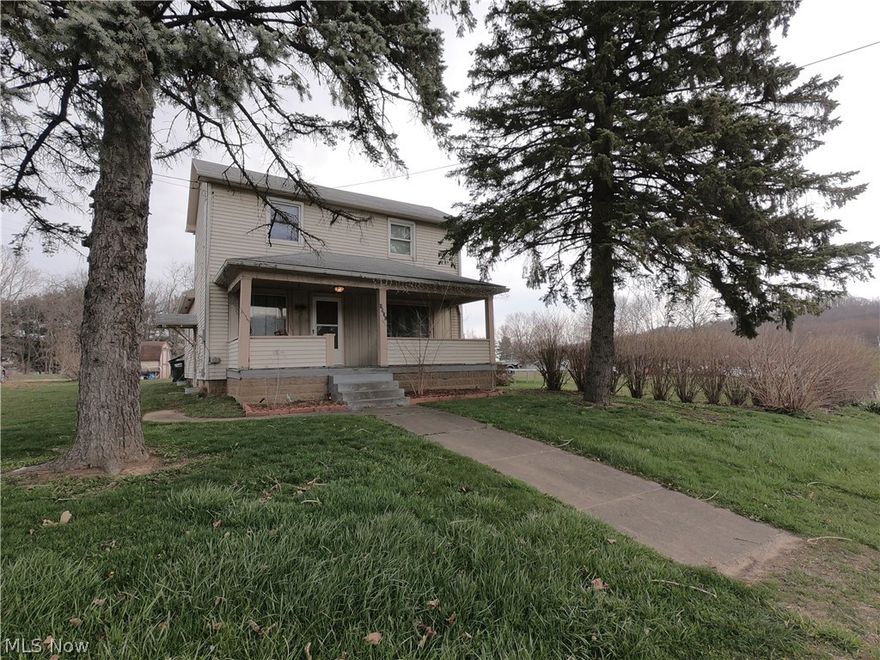 Over 3 acres right outside of New Philadelphia City limits.  
This two-story home offers three bedrooms with lots of character including wooden floors and woodwork throughout the home.  This home also includes a spacious back deck.  Make an appointment today , this property won't last, its priced to sell.