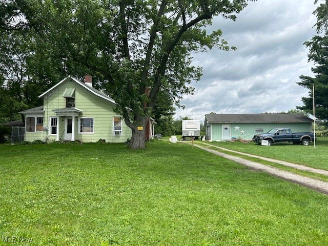 The value is in the nice 1 acre lot near the Westville intersection if there should be any expansion with business growth. It is also in West Branch Schools with a detached 24x40 garage and circular driveway. House needs a lot of work but has new electric box with all new wiring. Home can not be viewed at this time. Tenant occupied, please do not approach tenant or the home. For very serious buyers, home viewing can be scheduled with advanced notice. Detached garage can be viewed, tenant does not have access to this. This is a cash only sale due to the condition.