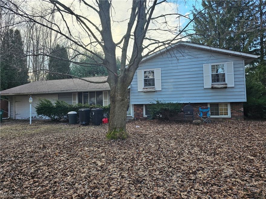 Sitting on the end of a dead end cul-de-sac on .32 Ac. Open Kitchen with sliders to rear patio and opening up to Dining Room. Large living room with large pictue window. Lower level is finished with a wood burning stove. Laundry/Utility room on lower level. Fenced back yard off patio.Home is being sold "AS-IS"