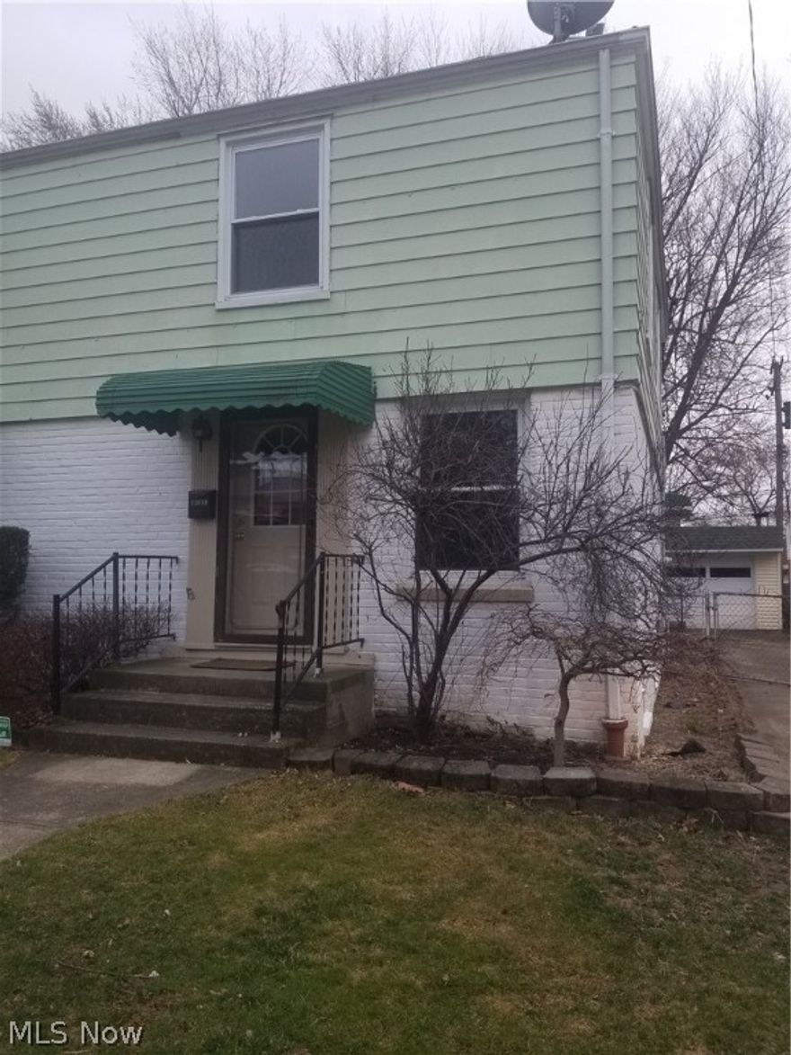 You've found it! Just unpack and relax! Spacious floor plan features 2 bedrooms, 1 bathroom, and spacious living room. Fresh paint, new flooring, and carpet make this home 'like new!'. Eat-in kitchen with updated appliances makes it a breeze to prepare meals ... but if you care to - you are seconds away from some of the sweetest eateries in the neighborhood! Convenient location close to East 185th St, Lakeshore, Waterloo... a few blocks from Lake Erie.