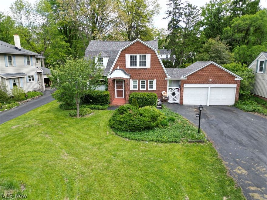 Welcome to this all brick, 3-bedroom home with tons of character in the Poland Local School District! Outside you'll notice the charm of this house but with a newer roof, siding, and downspouts as well as almost all updated windows (2017)! With over 1800 sq. ft., this home welcomes you into a living room with brick herringbone woodburning fireplace, real hardwood floors and a cute little room off this living space which would be good for an office, reading nook, or play area! The dining room has a new chandelier as well as hardwood floors and windows looking out to the private backyard! This leads into a huge family room with access to the outdoor patio! The kitchen comes with a fridge, dishwasher (2025), granite countertops and a cute eat-in area with tons of little storage cabinets! A half bath is just around the corner on the main level too! Upstairs has 3-bedrooms... one is a large bedroom with 2 closets; another has 3 closets and all with hardwood flooring! A full bathroom with tub/shower combo serves this level as well! The basement has a walk-out to the backyard, many different storage rooms and a laundry area with washer/dryer that stays! Outside is the 2-car garage which you can access through the covered breezeway that also leads into a huge storage area off the back of the garage. You heard it again- TONS of storage, great location, and lots of charm! Other updates include A/C 2025, chimney rebuild and flex-liner installed (2021), HWT 2022, and newer garage doors!