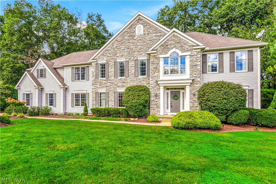 SPECTACULAR 5 Bedroom/4 & 1/2 Bath Stone MASTERPIECE on almost 2 Acres of Private Scenic Land with 321 Feet of Cuyahoga River Frontage built in the DESIRABLE River Bend East with a FOUR CAR GARAGE. Home Include: DRAMATIC Front Entrance to AMAZING Foyer which leads to the EXCEPTIONAL Custom Kitchen with Cherry Cabinets, STUNNING Hardwood Floors, & Granite Counter Tops, Center Island, MASSIVE Pantry, Double Viking Ovens, and Breakfast Area. The Large Kitchen Area leads to the MAMMOTH Great Room with PHENOMENAL Stone Fireplace, WONDERFUL Wall of Windows, & Hardwood Floors, Front Library/Office Area with Gas Fireplace, Marble Hearth, and Built in Bookshelves, Formal Dining Room, and an AWESOME First Floor Laundry Room. 2nd Floor offers the Large Master Bedroom with Walk In Closet & Master Bath, 4 other Large Bedrooms with 2 Jack & Jill Baths. The 4-Tiered Back Deck was built to capitalize on the AMAZING Scenic Views plus a DRAMATIC Custom Water Fall. Home offers Front & Back Staircas