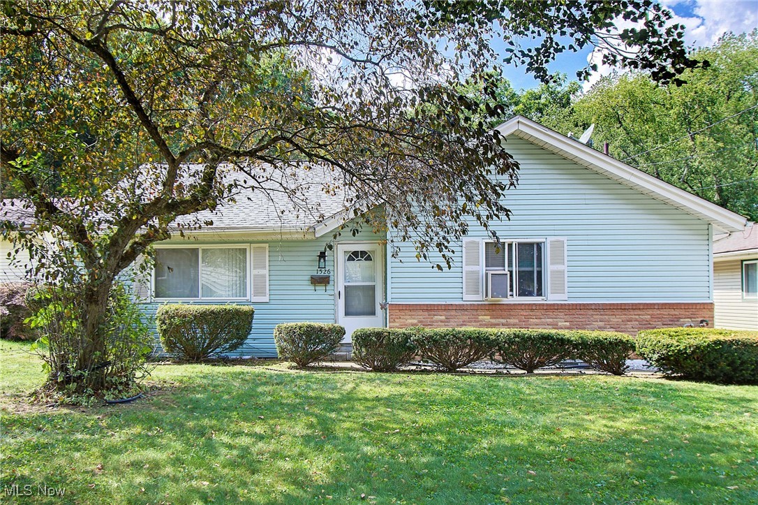 Welcome to 1526 Hilton Dr. This spacious family home is truly a Diamond in the Rough. Just waiting for your updates. This 3 bed, two and a half baths, split level home is a surprise that it is so much larger than it appears from the front. Located in Merriman Valley, the humongous back yard ends at the walking path at the Sand Run Metro Park. While we're out here, this yard is perfect for gardening, family get togethers or just hanging out enjoying nature. Lets step inside, the spacious living room with a cathedral ceiling. Let step up to the eat in kitchen. Granite countertops, built in double ovens, and range and fridge. All items convey. The steps leading upstairs and the entire third floor have original hardwood floors. The owners suite has own half bath and large closets. There are two other bedrooms and bath on this floor. Downstairs the lower level family room is perfect for the family and entertaining. There are sliding doors leading to the covered patio. This floor also includes a full bath, laundry area, Utility area with new Boiler and new Hot water tank. Washer conveys. The basement has two storage areas.The two car garage and storage area completes this property. This is a great family home that is just waiting for your special touches. A great fall project! Don't miss out! Schedule your viewing today.