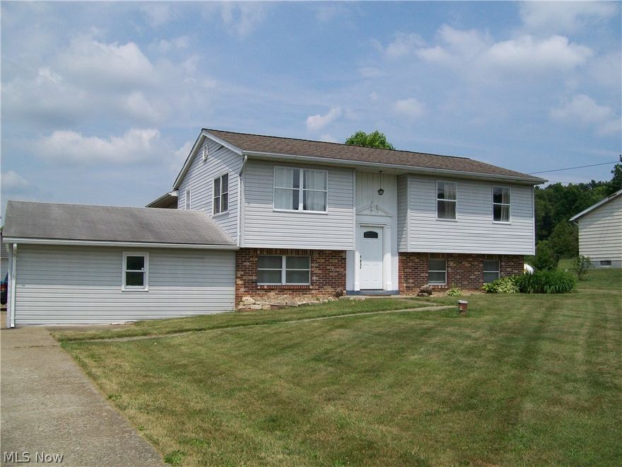 Fantastic buy in the Tri Valley school district. Beautifully decorated home with 3 bedrooms, 2 baths. 2 car attached garage, also 24 x 40 detached garage with 10 x 20 workshop. Nice sunroom off kitchen that goes to outside 2 level deck. Family room in lower level has wet bar. Newer furnace, central air and hot water tak.