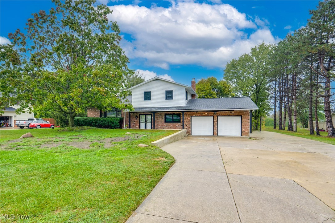 Welcome to this spacious 4 bedroom, 2 bath Montville Township split level nestled on an amazing, private 2 acre lot! Plenty of room for goats, chickens, and even a horse or two! Fruit trees grace the yard and there is even a spring in the rear of the property! The outbuilding boasts concrete floors, electric and heat! Concrete RV pad with plug-in option located right next to outbuilding! Home features open floorplan with 1st floor bedroom that can be used as a bedroom, office or den! There is also a full bath located on the first floor. The second floor features 3 additional bedrooms and a full bath. The lower level consists of a partial, clean and dry basement for all of your storage needs! The roof is approx. 6 years old and boiler system has been serviced regularly. Well equipment is within last few years as well. Huge screened in rear porch to enjoy morning coffee or evening meals that looks out into the private rear yard. Come tour this property and fall in love!