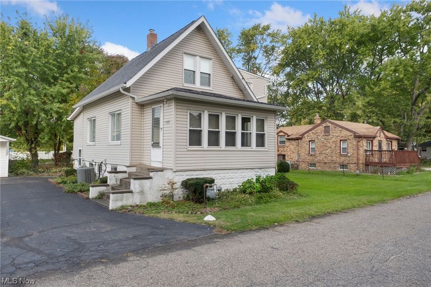 Great opportunity to move right into a well maintained home that sits on 4 parcels in Lakemore that totals about a quarter acre. Enjoy some privacy and additional yard space for the family to enjoy.  The home features a 2 car garage (hard to find at this price point), 3 bedrooms and 2 full baths with approximately 1,314 total square foot of livable space (plus a full basement and garage for storage).  This home is ready for you to put your personal touches on, but the major items have good life left in them - including a replaced furnace (2006), professional waterproofed basement, new roof (2007) and siding (2007).  Walk right over to Springfield's Recreation Park and enjoy the beautiful views of Springfield Lake.  A lot to offer here an an affordable price - come check it out! Back on market due to no fault of seller.