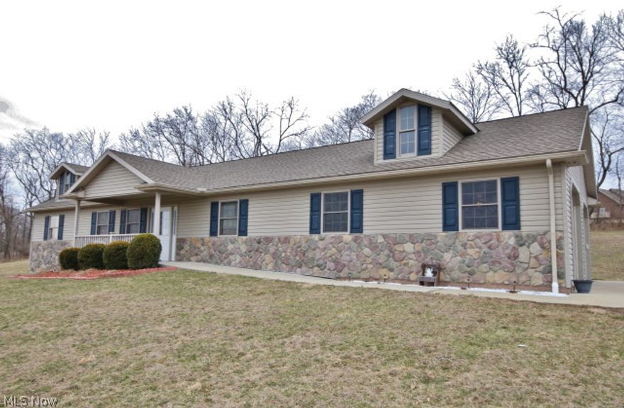 Beautiful View on nearly 2 acres from this Open Floor Plan,  3 Bedroom, 3 Full Bath Handicap Accessible Home with amenities that include a ramp from the attached 2 Car Garage going inside the main floor laundry room, lower countertops in Kitchen and Stairlift to access the mostly finished basement that could be used as a Family Room or an additional Living Suite with it's own Full Bath! Owner's bedroom on the main floor features built in dresser drawers and full bath with walk-in shower. Home is complete with above ground pool plus nice deck with patio area. Call today for appointment to view this Must See Home!