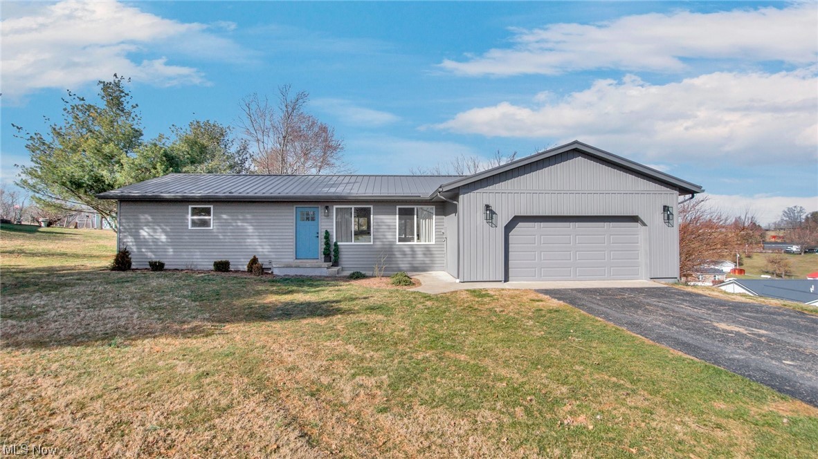 Beautifully renovated home filled with so many modern updates for today's lifestyle! Sit in the open concept living space and enjoy the natural light that streams through large windows in the front and back of the house, or relax on the spacious deck that overlooks a lush 1.3 acre yard. Many custom features, including a gorgeous accent wall, tile/glass en-suite shower, great laundry space, and an amazing kitchen design with huge quartz countertop peninsula! A complete list of updates in supplements/documents. West Muskingum LSD, quick access to I-70. WELCOME HOME! Agent is an Ohio licensed real estate agent.