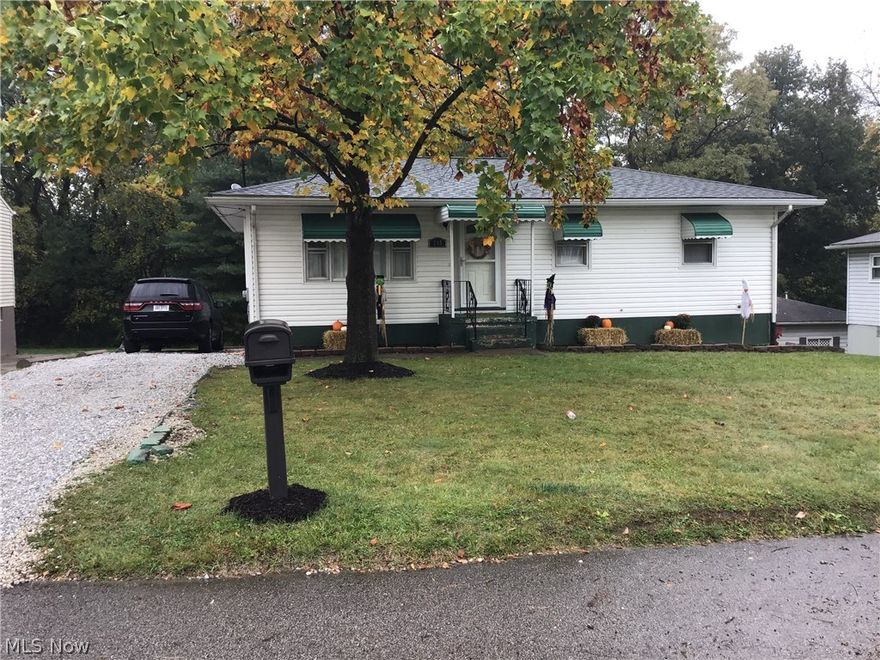 Charming Ranch with 3 bedrooms, 1 1/2 baths, Remodeled bathroom & kitchen, finished basement, walkout basement, large 2 1/2 plus garage, roof 2012, furnace 2015, C/A 2009, new electric panel 2015, new front door & storm 2019.