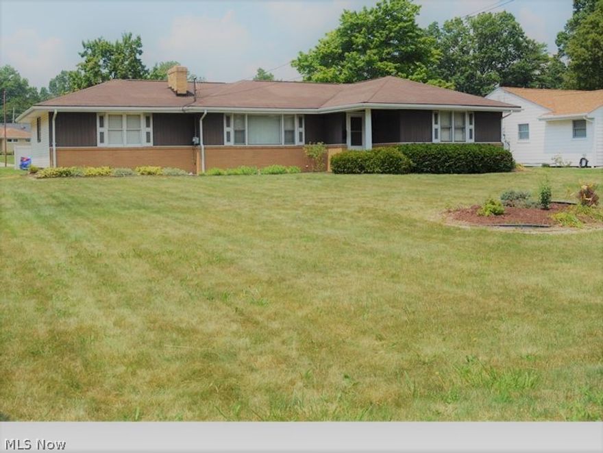 Come Check out this Extremely Spacious Ranch 3 bedroom Home!! It sits on a large Corner lot in Austintown!! The driveway faces the back of the home for added privacy!! Walk right into a great space...hardwood floors throughout, an eat in kitchen and dining area that open up to a 3 season patio sun room! Home has a Whole House Fan for those days when you just don't want to turn on the air and sit in your enclosed patio and feel the breeze!! Bedrooms have great space and distance form one another comfortable living! You can just walk right down into the basement that contains a separation wall from the utility area where the washer and dryer stays...to the partially finished basement area that can be extra living space or an entertainment area! This home has been cared for by one family for a long time and now its your turn! Priced under tax value for an easy sale from estate to new ownership! New Furnace, New Electric Circuit Panel Box & the roof is approx. 10 years old!