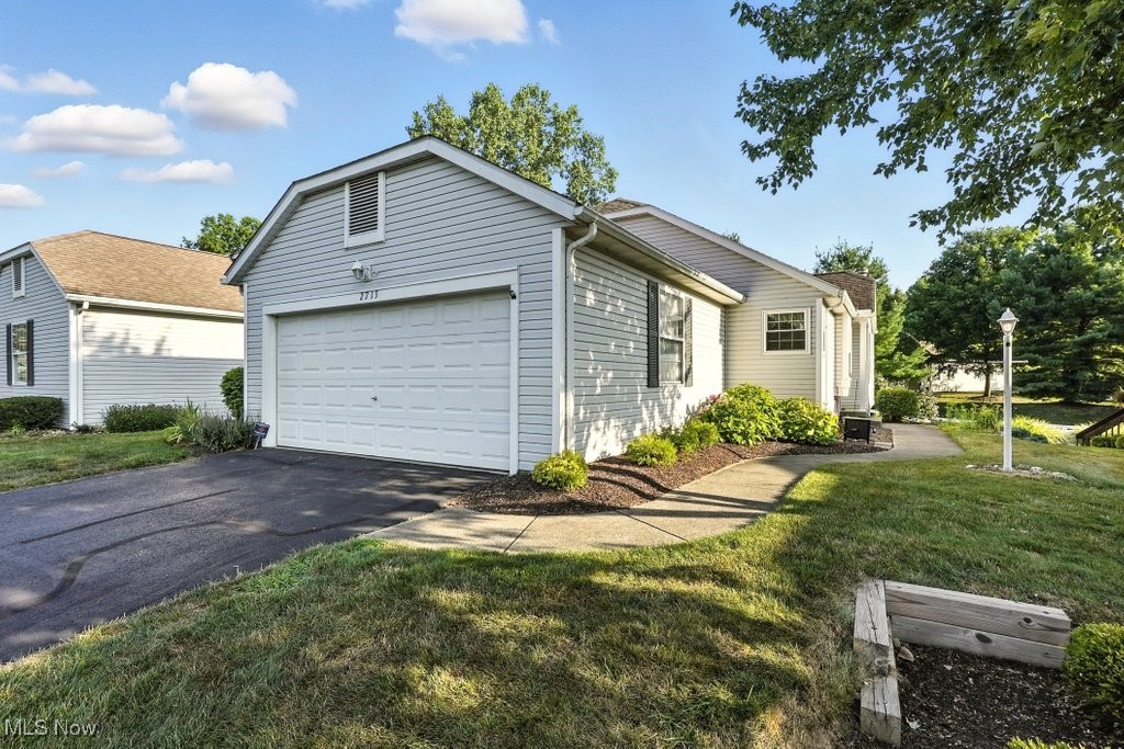 Welcome to 2713 York Dr., Low-Maintenance living in desirable Woodbury Condominiums!
This beautifully maintained and updated condo in Stow is located between Fishcreek and Graham Rd, with convenient access to shopping, dining, and local amenities.
This spacious home offers 2 bedrooms with the potential for a 3rd bedroom, along with 3 full bathrooms and a flexible floor plan. The eat-in kitchen features granite countertops, ample cabinetry, a pantry, and comes fully applianced. You'll love relaxing in the cozy family room with a gas fireplace and views of the private deck and backyard.
The first-floor laundry room includes a utility sink, closet, and provides easy access to the attached 2-car garage. Washer, dryer, and an additional refrigerator are included in the sale. The second bedroom and a full bathroom are also located on the main floor, offering a practical layout for guests or single-floor living.
The finished basement expands your living space with a large rec room, a brand new third full bath, and a flex room that could serve as a third bedroom, office, or hobby space. Plus, there's a separate storage/workshop area for all your extras.
Additional features include: One-year APHW home warranty included for buyer peace of mind. Hot water tank (2017)
Don’t miss your chance to own this move-in ready condo in a quiet, well-maintained community.