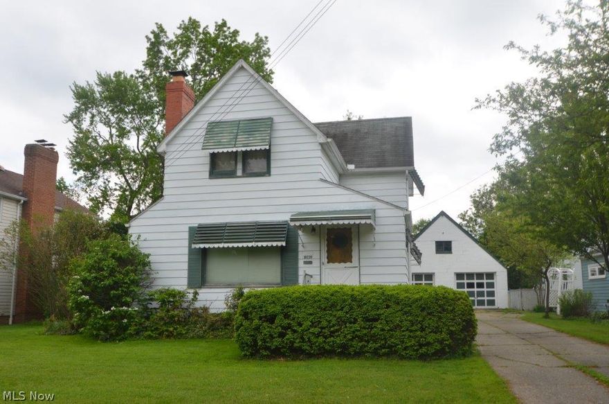 This colonial has a great location, close to West Gate,  the Metro Parks, and minutes from Kamm's Corner. This rear yard is partially fenced in and boasts a 2 car detached garage with side patio. The kitchen is wide open and a blank canvas for the creative and imaginative buyer. First floor living room is expansive with a cozy fireplace for the long Cleveland winters. There is a 1st floor bedroom with attached bath and first floor pantry/laundry. Buyers will love this location....come see this blank canvas it will not last!